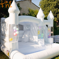 Château gonflable d'extérieur combiné avec toboggan, location de château gonflable de luxe blanc