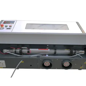 Mini 40w/50w machine de découpe laser 3050 co2 tampon en caoutchouc faisant la machine de gravure laser pour photo/cristal