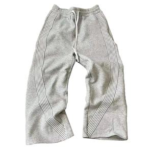 กางเกงลำลองลายทางสำหรับผู้ชายมาใหม่กางเกงวอร์มทรงหลวมเอวยางยืดมีเชือกรูดแนวฮิปฮอปกางเกงวิ่ง - Product Image 4