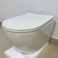 Cuvette de toilette moderne en céramique monobloc sans rebord pour la maison, réservoir dissimulé, WC suspendu, toilette pour villa, salle de bain