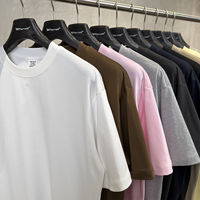 T-shirt vierge streetwear pour homme, 220 g/m², 100 % coton tricoté, écologique, respirant, coupe oversize, vente en gros, personnalisable avec logo