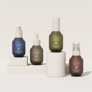 Frascos cuentagotas de aceite esmerilado únicos de 30ML y 1oz vacíos personalizados botella de suero facial de vidrio cosmético de lujo con bomba