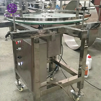 Machine semi-automatique rotative d'alimentation et de collecte de bouteilles / Collecteur de bouteilles - Table d'accumulation