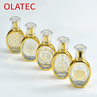 Nouveau flacon de parfum en verre de style moyen-oriental, plaqué or, atomiseur sculpté de manière complexe ; flacon d'huile essentielle avec vaporisateur