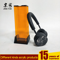 Présentoir moderne personnalisé en acrylique PMMA noir orange sans fil pour casque Bluetooth Support écologique pour casque d'écoute
