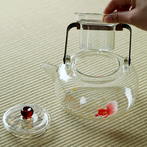 Tetera de vidrio de borosilicato engrosado con tapa, resistente al calor, para preparar té en el hogar, apta para calentar en estufas eléctricas y de cerámica. - Product Image 4