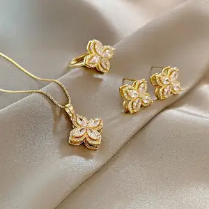 Tiktok Popular Creative Design Rotatable Four Leaf Necklace Female Fashion Lucky Ring Ear Stud