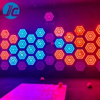 Mur d'activités interactif lumineux à LED en matériau PC activé pour salle de jeux, labyrinthe, arène, jardin, aéroport, parc de trampolines