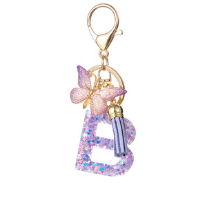 Llavero de Resina con 26 Letras, Borla de Estrella Morada, Colgante para Bolso de Mujer, Accesorio Decorativo de Moda para Mochila Escolar de Estudiantes - Product Image 2