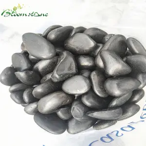 Piedra natural negra pulida para decoración de Patio, guijarros de Río, Roca, a la venta