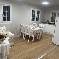 Maison conteneur pliable en acier à double aile, éco-responsable, avec panneaux sandwich, cabine modulaire écoénergétique pour usage domestique ou bureautique