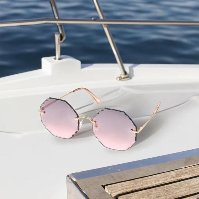 Trending 2026 Hot Selling Design Rimless Polarized Lenses Metal Frame Vintage High Quality Sunglasses UV400 Protection Logo