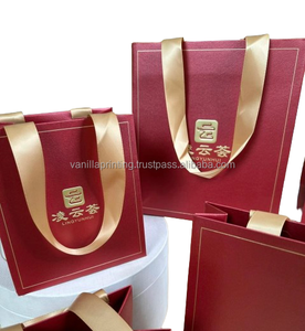 Sac d'emballage de thé en papier avec logo doré gaufré personnalisé avec poignée en ruban pour les promotions de supermarché utilisation artisanale de parapluie de vaisselle - Product Image 1