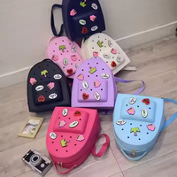 Sac à dos imperméable en silicone pour enfants avec trous décoratifs pour accrocher des breloques, sac d'école tendance pour tout-petits garçons et filles