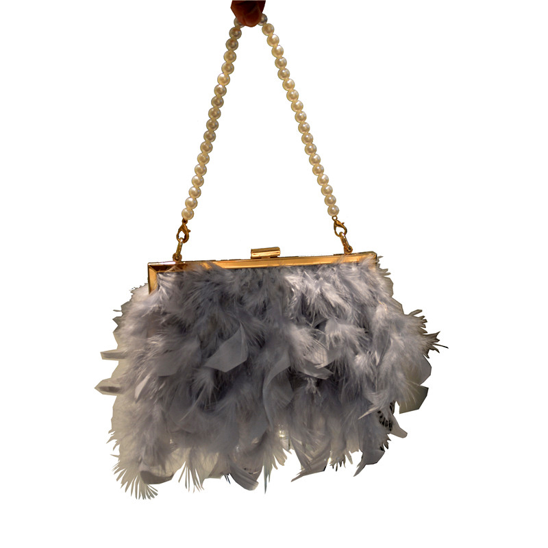 feather sling bolsa
