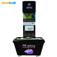 Table de sable géographique numérique Seeball avec affichage holographique 1000x1000, interaction gestuelle, thème volcanique