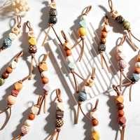 Breloques de sac en perles de bois style bohème, multicolores, faites à la main, ornements suspendus en bois perlé pour sacs à main, jeans, pantalons, accessoires de mode