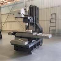 Centre d'usinage vertical VMC650 Machine optique Liaison triaxiale Haute rigidité Lit en fonte de résine