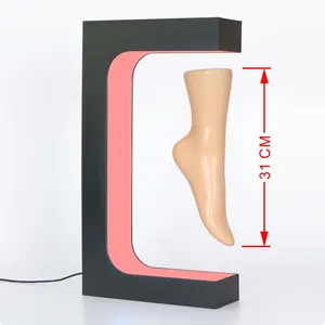 Manufacturer direct supply 360 degree rotation E shape magnetic levitating sock display rack with Led Light