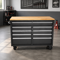 Établi de 52 pouces avec dessus en bois massif Coffre à outils à 9 tiroirs sur roues Chariot à boîte à outils à revêtement noir Système de stockage d'outils en bois massif
