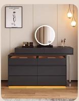 Bureau de toilette moderne noir avec plateau en verre, éclairage LED intégré, plusieurs tiroirs et armoire latérale pour chambre à coucher