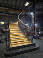 Escalier en colimaçon courbé de style américain contemporain CBMmart, marches en acier inoxydable, utilisation intérieure, écologique, sûr et durable