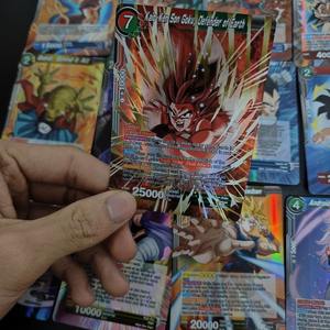 100 unids/caja versión en inglés. DBZ Son Goku Son Gohan <span class=keywords><strong>Piccolo</strong></span> Trunks recoger personaje niños caja ciega Anime <span class=keywords><strong>juego</strong></span> de cartas Tarjeta de papel SSR - Product Image 4
