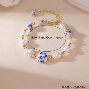 Bracciale in ceramica con perle e fiori, stile porcellana blu e bianca, collezione Primavera Estate 2026, per donna - Product Image 3