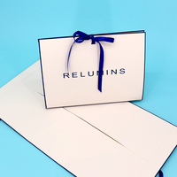 Sac en papier kraft brun de luxe avec logo personnalisé, emballage cadeau blanc, avec poignées en corde de nylon torsadée