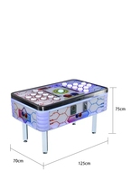 Machine de jeu à pièces permettant aux adultes et aux enfants de jouer les uns contre les autres avec des billets de loterie et des haricots