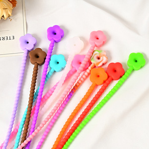 Ataduras de cables de silicona con forma de flor, organizador de cables desmontable para escritorio de oficina, gestión de cables de datos, color aleatorio - Product Image 1