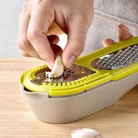Presse-citron manuel 10-en-1 en acier inoxydable avec zézette, râpe à fromage et à ail, et filtre intégré – Ustensile de cuisine