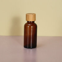 Botol Kaca Amber Minyak Esensial dengan Logo Custom Sablon, Kapasitas 5ml-100ml, Bentuk Bulat, Tutup Sekrup Bambu