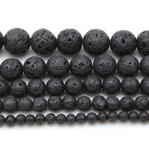 Cuentas de piedras preciosas redondas negras naturales al por mayor, cuentas de <span class=keywords><strong>Lava</strong></span> porosa de roca volcánica de aceite esencial para la fabricación de pulseras de joyería Li - Product Image 1