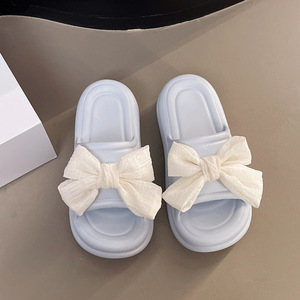 Zapatillas de suela gruesa para exteriores de verano para mujer con lazo, Sandalias planas de una palabra cruzadas a la moda, versión neta, sensación de caca - Product Image 6