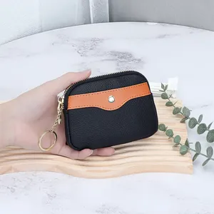 กระเป๋าใส่เหรียญ AndoBag รุ่นมินิสำหรับผู้หญิง หนังวัวแท้ แฟชั่นเรียบง่าย กระเป๋าใส่เหรียญแบบซิป พร้อมช่องใส่บัตรและพวงกุญแจ รุ่น 1019 - Product Image 3