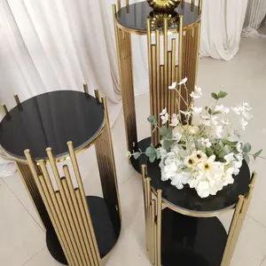 Mesa de sobremesa de três peças com tubo vertical cilíndrico com base redonda preta para decoração de casamento