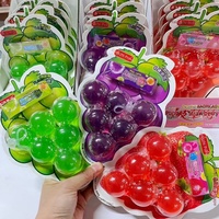 Bonbons anti-stress pour enfants, billes de gelée de fruits Pop Bubble en forme de raisin, saveur fraise, vert, violet, lot de 6 pièces multicolores en plateau