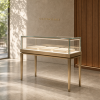 Moderne Luxus-Glasvitrine mit LED-Beleuchtung Umweltfreundliche Langlebige Edelstahl-Schmucktheke mit Anpassungsmöglichkeiten