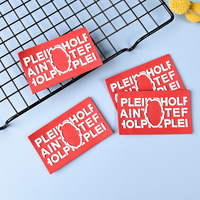 Étiquette de vêtement personnalisée, patch en caoutchouc PVC silicone personnalisé, logo de marque en relief 3D à coudre pour t-shirts