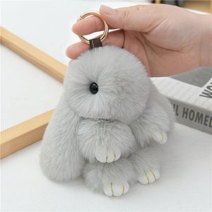 Bán buôn ánh sáng Keychain thỏ hình sang trọng bóng lông Keyring làm bằng nhựa kim loại PVC và hợp kim - Product Image 2