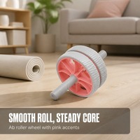 Rouleau abdominal à double roue avec accents roses et poignée texturée – Équipement de fitness pour l'entraînement du tronc OEM ODM