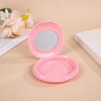 Étui compact portable rond en plastique rose personnalisable avec miroir pour le maquillage et l'emballage de poudre de soin de la peau