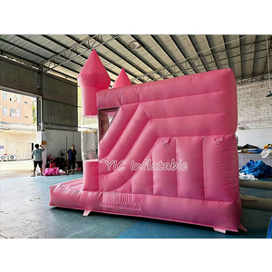 Château gonflable rose pastel avec toboggan, structure gonflable commerciale pour location événementielle, avec piliers transparents pour balles - Product Image 5