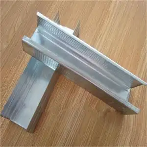 Metal stud track for interior dry wall