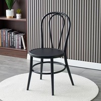 Chaise de salle à manger empilable en fer forgé moderne et durable avec dossier croisé, pour l'extérieur et l'hôtellerie, vente en gros