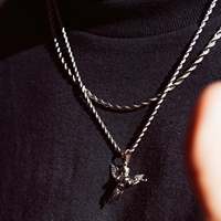 Vente en gros de bijoux en acier inoxydable hypoallergénique étanche en pvd plaqué or 18 ct pour la fabrication de pistolets collier d'anges pour hommes