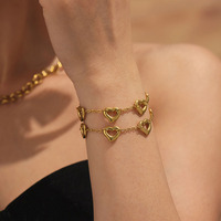 Bracelet minimaliste romantique en acier inoxydable hypoallergénique plaqué or, creux, en forme de cœur, pour femmes