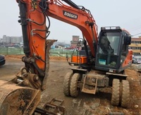 Excavatrice sur chenilles d'occasion Doosan DX140 d'origine coréenne, modèle moyen, hydraulique, à faible consommation de carburant, 140 CV