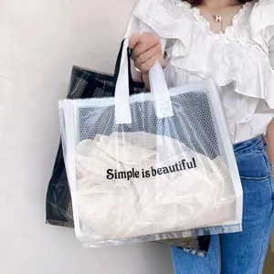 Fabricación de fábrica Impresión de ropa Bolsa de plástico Mango de lazo suave Malla de plástico Ropa Boutique Bolsas de compras